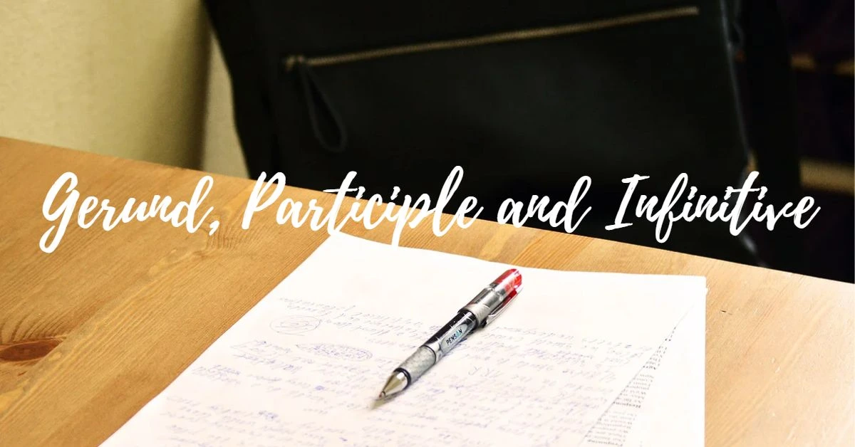 a pen and a pen on a desk with a pen and paper